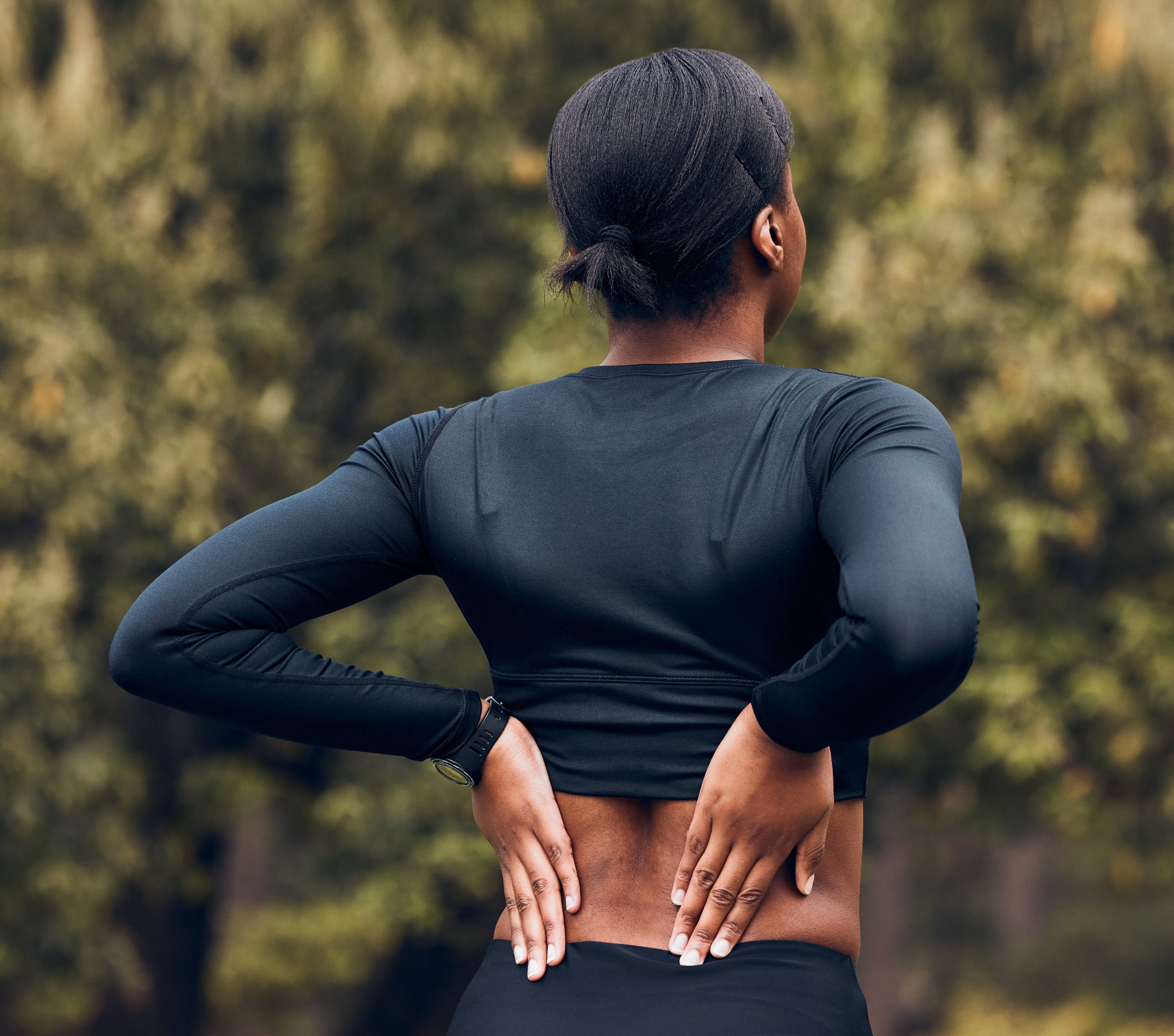 back-pain-fitness-and-sports-woman-outdoor-for-sc-2023-11-27-04-59-53-utc