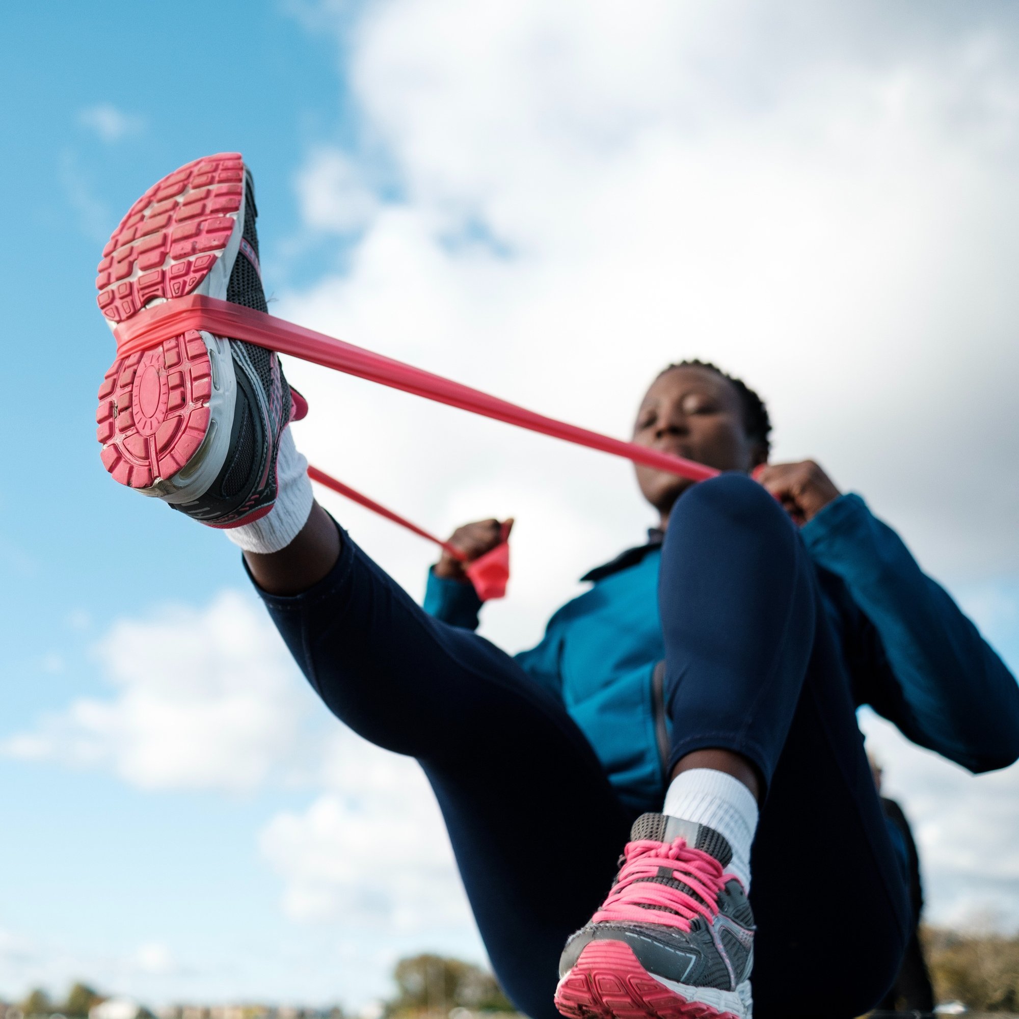 mature-black-woman-using-resistance-band-outdoors-2024-07-10-03-59-12-utc (1)